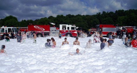 ACBC Burn Camp participants playing in foam, photo by Jackson Professional Firefighters